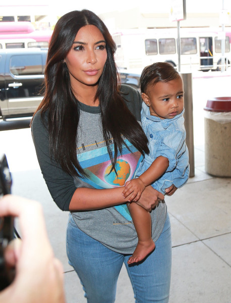 Kim-Kardashian-Carrying-North-West-LAX-Photos